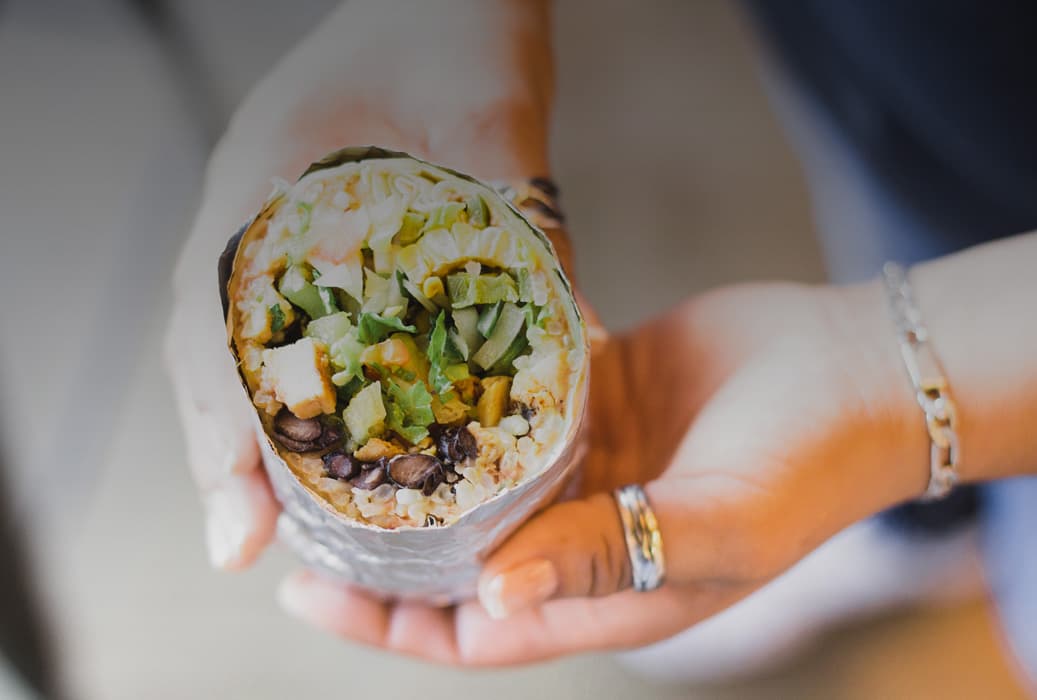 Massive grilled burrito with fresh toppings